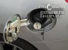 заправочное устройство с накрученным на него заправочным переходником