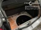 вместо запасного колеса лежит баллон объемом 54л, вид слева