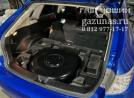 вместо запасного колеса лежит баллон объемом 54л, вид справа