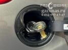 заправочное устройство с накрученным на него заправочным переходником