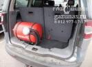 цилиндрический баллон объемом 50л в багажном отделении на сложно-составной раме за третьим рядом сидений