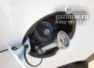 заправочное устройство с накрученным на него заправочным переходником